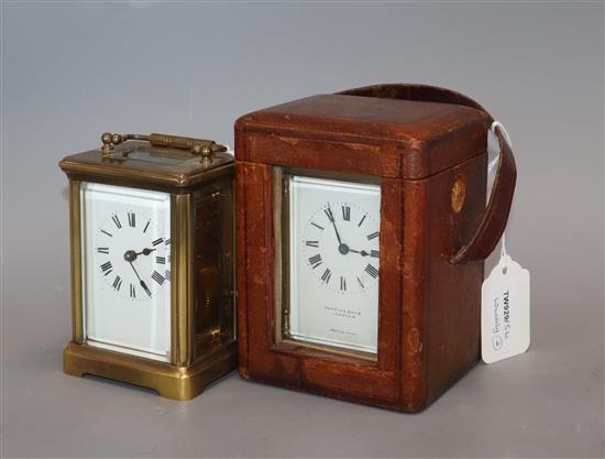 A Mappin & Webb gilt brass carriage timepiece in leather outer case and another carriage timepiece